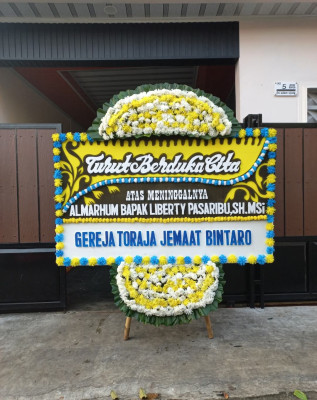 Papan Bunga Duka di Kuwarasan
